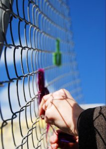 The community comes together in this creative placemaking endeavor, "The Path of Us: A Public Art Fence Weaving".