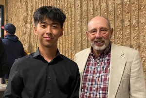 Richard Cho (left), a Leonia High School senior, received from Doug Bauer (right) the The Class of 1964 Ralph Gregg Memorial Scholarship Fund's 2022 award.