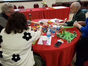 The Place It!  approach encourages people to design spaces using arts and craft supplies and toys.