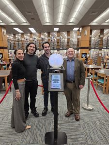 NNJCF's Danielle De Laurentis (left) and Leonardo Vazquez (far right) joined artists Juanli Carrión and Rodolfo Kusulas to pose with the Mind Your Feeling exhibit.